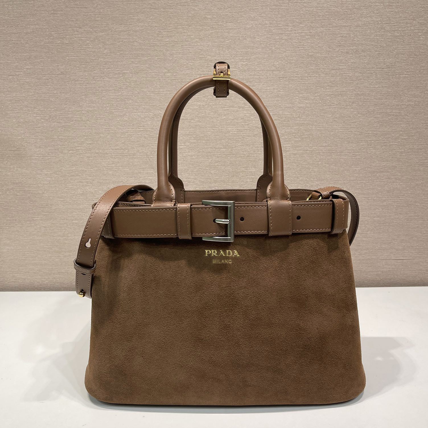 Pra*a top handle bags